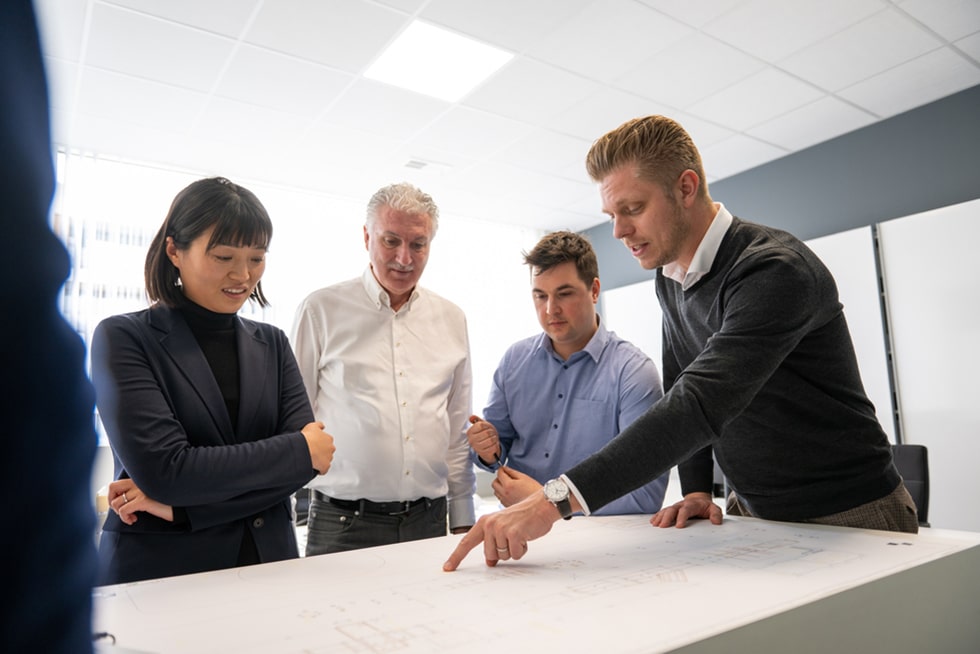 Team im Besprechungsraum