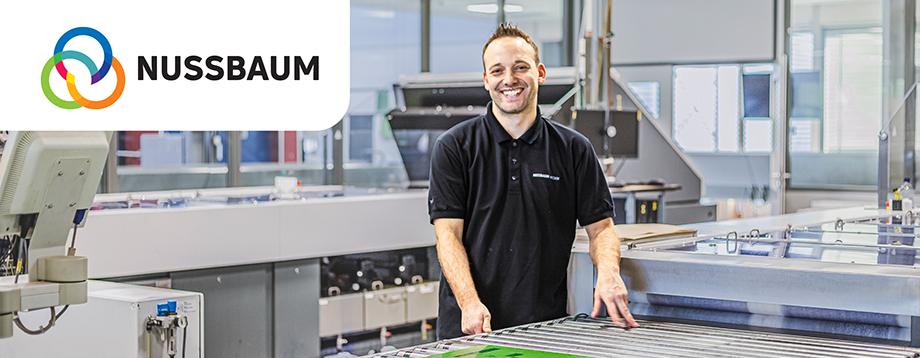 Nussbaum - Mitarbeiter mit Rollenoffset-Druckmaschinen