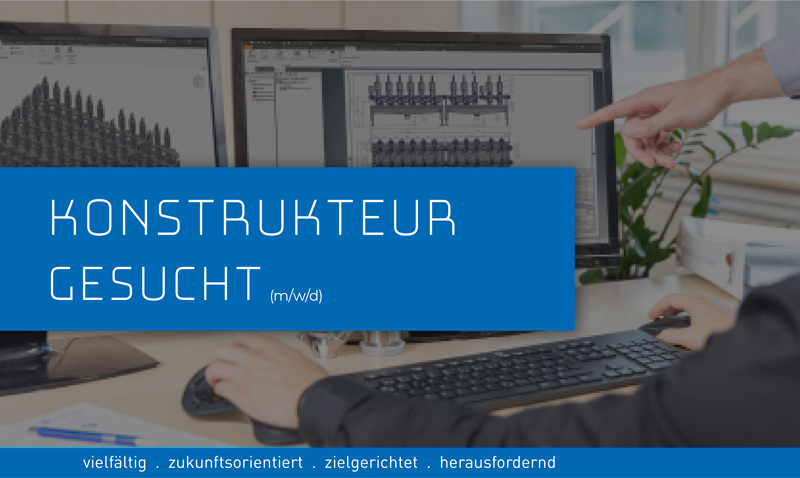 Mitarbeiter, die Entwürfe am Computer analysieren